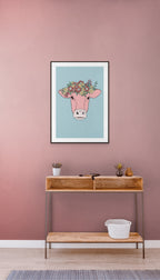 Kua med blomsterkrans